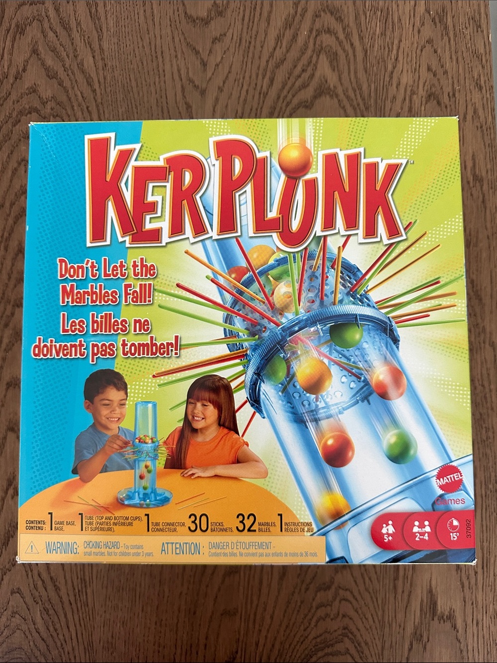 Mattel KerPlunk Game with Bright Red, Orange, Yellow, Green and Blue Marbles
